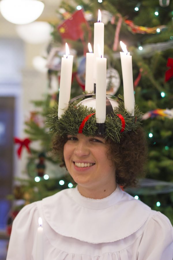 Photo courtesy of Sam Schlouch.
Senior Eryn Maccabee smiles as dressed up as her role as Lucia for the more traditional celebration of Sankta Lucia. The event is on Dec. 17 at 7 p.m.