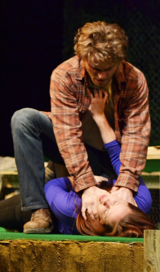 Photo byCam Best.
Erik White chokes his pregnant wife, Amy, in this play about post-traumatic stress disorder. 