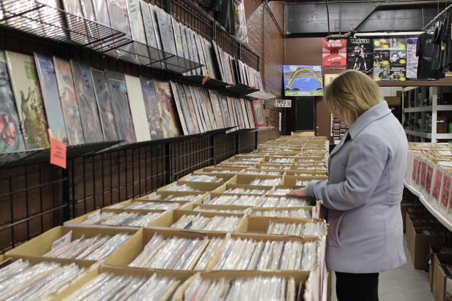 Augustana junior Catherine Cross shops for vinyl records at Ragged Records, a small record shop in Davenport. Ragged Records carries a variety of new and old vinyl, along with other music related items.
Photo by Linnea Ritchie.