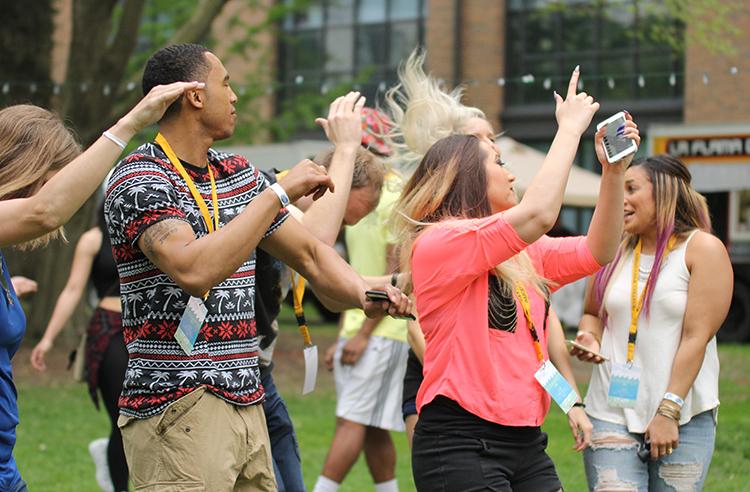 Augie Community enjoys the Sloughfest Music Festival on Saturday May 8. in the Lower Quad.Photo by: Janie Le.