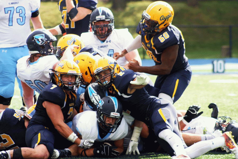 Vikings fight for the ball during their game against Elmhurst College on Saturday. The Vikings lost 14-3 and fell to 2-1 in the CCIW. They will play Illinois Wesleyan University this weekend.
Photo by: Tawanda Mberikwazvo