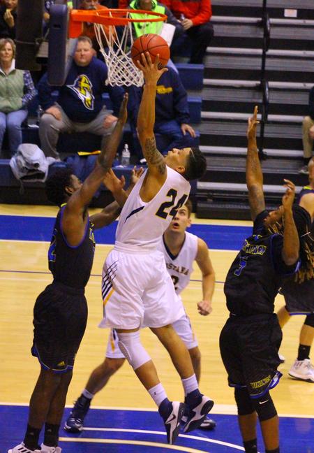 Sophomore forward Pierson Wofford goes up for a shot during the mens basketballs game against North Park University. Augustana lost the game 78-87 and fell to 0-1 in conference play 5-2 overall. Photo by Tawanda Mberikwazvo.