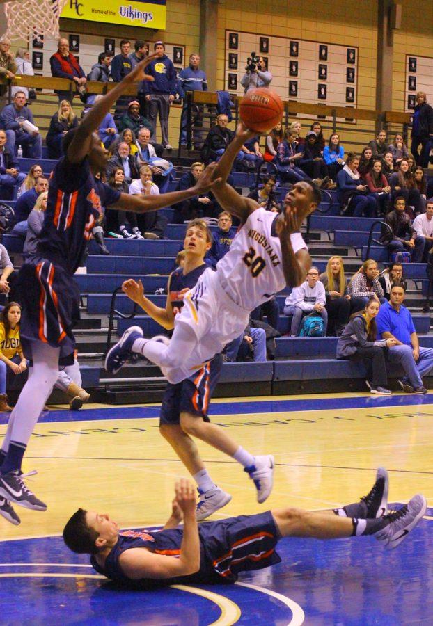 Sophomore Crishawn puts up a shot in the Vikings game against Wheaton. The VIkings won 73-71 and are 1-1 in the CCIW. Photo by Tawanda Mberikwazvo