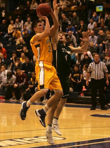 Junior Dylan Sortillo shoots the ball in Augustanas victory against Illinois Wesleyan. The Vikings won 92-77. Photo by Alia McMurray.