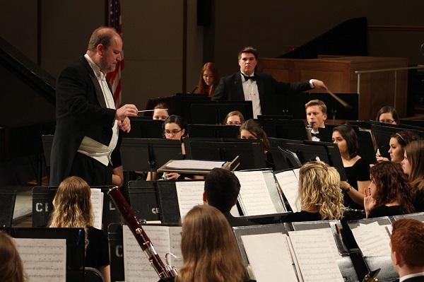 Dr. James Lambrecht conducts the Symphonic Band before Saturdays concert. The ASB just returned from their tour in Spain. Photo by Kevin Donovan