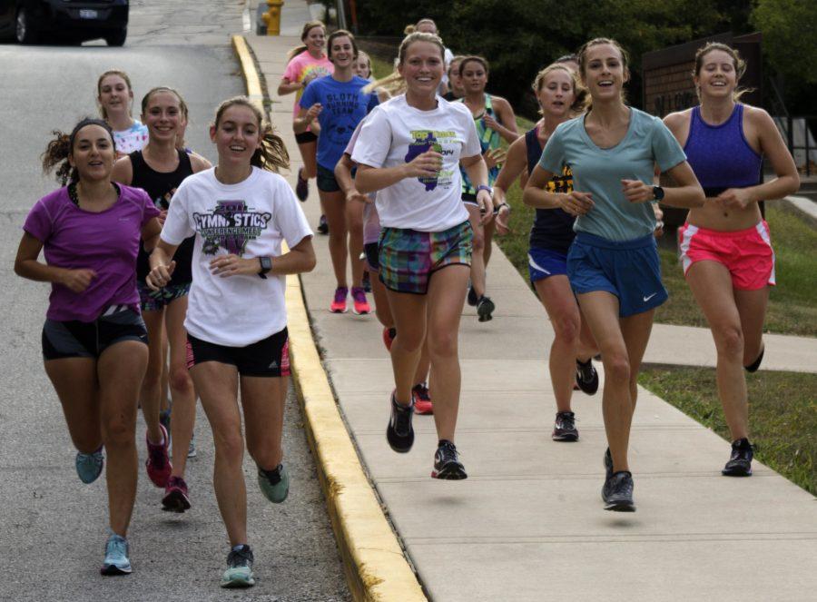 The womens cross country team runs through there workout. The team had a meet at Western Illinois last Friday. Photo by LuAnna Gerdemann