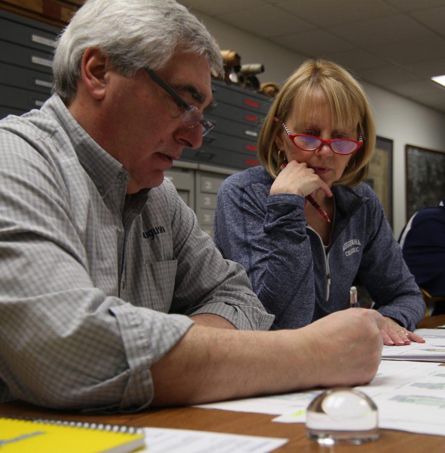 (left to right) Director of Facilities Joe Scifo and Dr. Kathy Jakielski meet to go over the details of the layout for the new CSD building. Photo by Kevin Donovan
