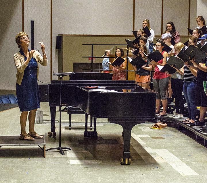 Dr. Sonja Hurty directs the Augustana Concert Chorlae, on Thursday, Sept. 20. Photo by Emma Gannaway.