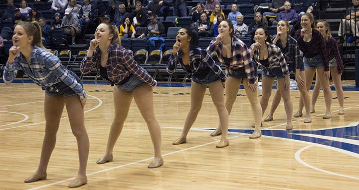 Augustana Vikettes perform their country dance during halftime of the mens basketball game against Caroll on Saturday December 1, 2018. Vikings won 68-56.