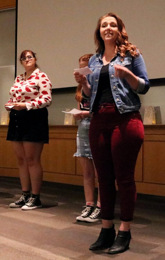 Senior, MJ Mason, delivers a line of a monologue titled My Short Skirt with fellow members of the Vagina Monologues. 