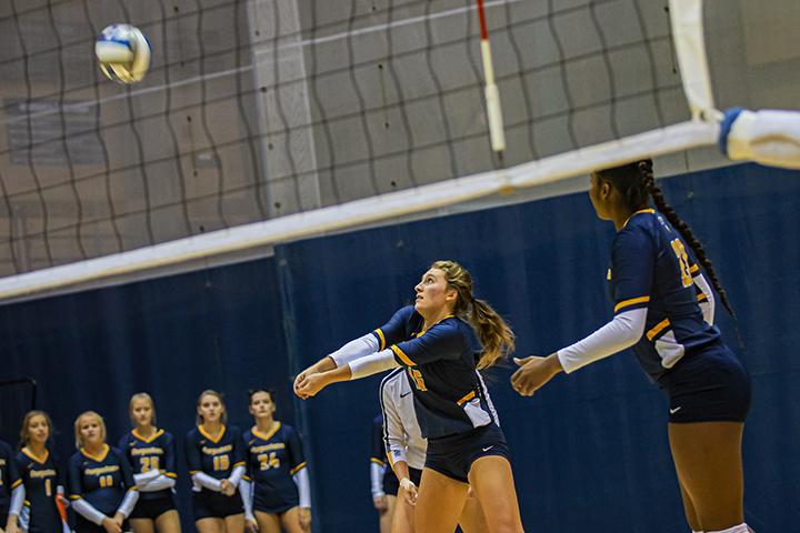 Augustana senior Madi Glatz attempts an assist during the second match of the game. The Augustana Vikings lost to Millikin by 3-0 (28-26,25-23,25-19) on October, 11, 2019.