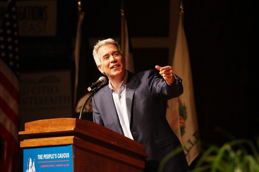 Former US Representative Joe Walsh and Republican candidate addresses a question from the panel at The Peoples Caucus forum for presidential candidates on Sunday, January 12 at Davenport North High School. Photo by Kevin Donovan
