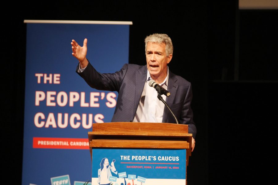 Former US Representative Joe Walsh addresses the crowd at The Peoples Caucus forum for presidential candidates on Sunday, January 12 at Davenport North High School. Photo by Kevin Donovan