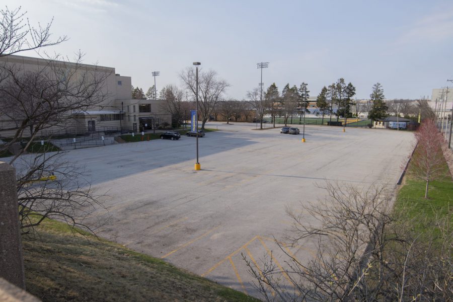 The Centennial parking lot remains empty with the exception of a couple of public safety vehicles on Thursday April 2. Photo by Kevin Donovan