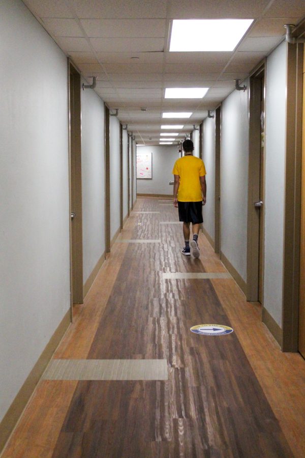A student walking the Westerlyn Halls on Friday September 4, 2020.  Photo by Lauren Pillion. 