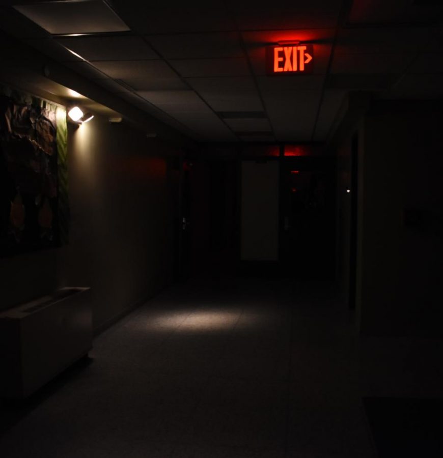 Emergency lights light up the hallway of Erickson Hall during the outage.
