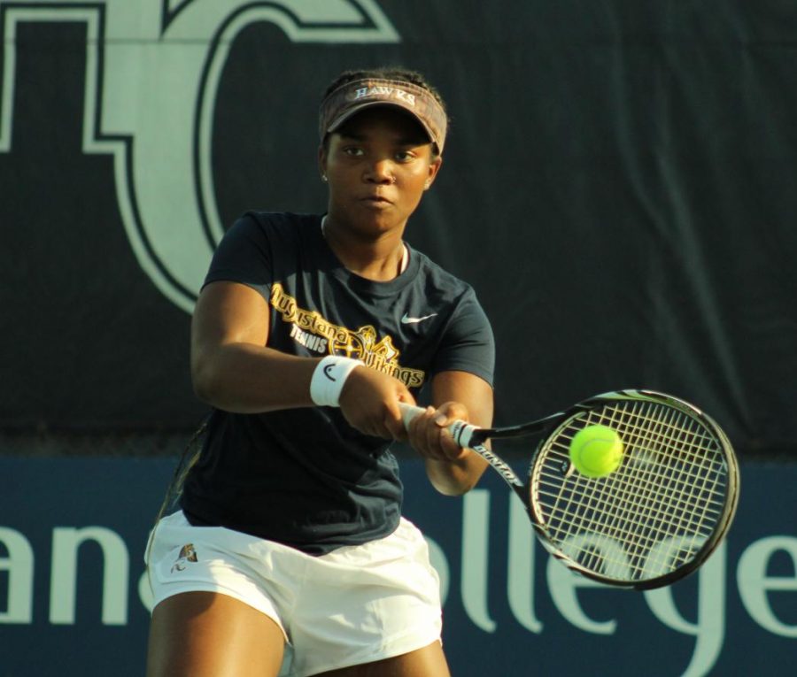 First-year Kyliah Shirley keeps a strong follow-through at one of the Augie Vikings Matches this past fall. 
