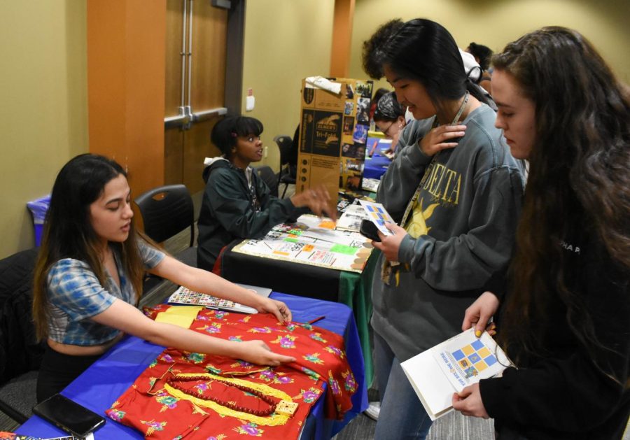 Sophomore Grisma Niraula hosts the Nepali Student Organization table at the Campus-Wide Diversity Celebration on Friday, April 29, 2022.
