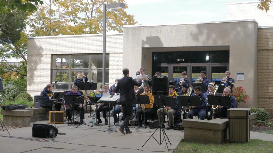 Performance in front of Bergendoff Hall of Fine Arts.