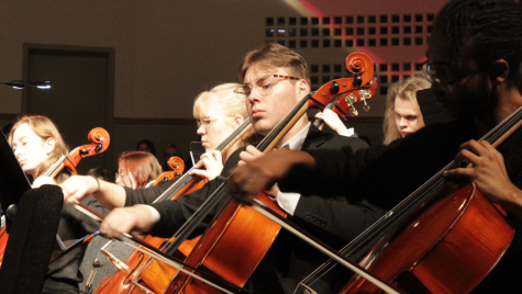 First year Graham Hunt plays cello in the Christmas at Augustana dress rehearsal on Dec. 1, 2022.