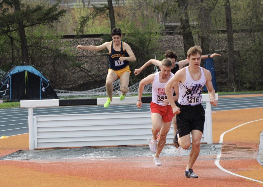 Senior Ethan Gray competes in the mens 3000m steeplechase at Wheaton College on April 14, 2023. Gray is a captain for the mens track and field team as well as one of the many senior athletes graduating this term.