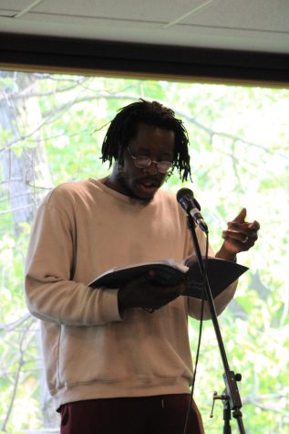 Aubrey Barnes, a local spoken word artist, reads his poems in the Brew.