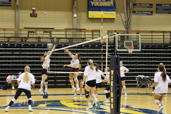 Members of the Augustana College’s Women’s Volleyball Team practice in the Roy J. Carver Physical Education Center.