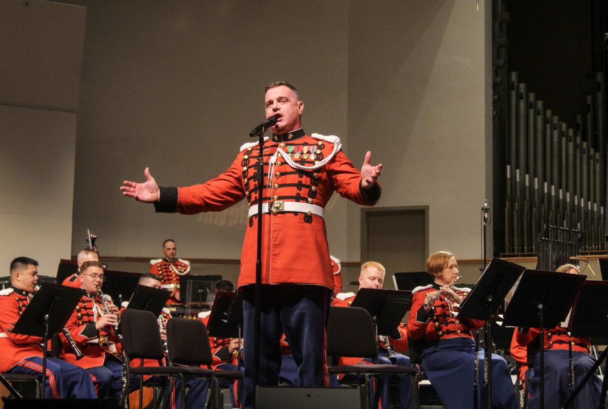 Baritone Vocalist and Concert Moderator Master Gunnery Sergeant Kevin Bennear of Keyser performs at “The President’s Own” United States Marine Band Concert at Centennial Hall on Oct. 13.