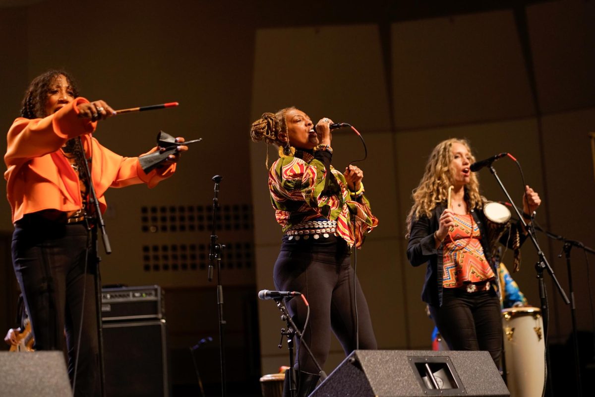 From left to right, The International Women of the Drum and Voice, members Phylliss Bailey Brooks, Bridget Graham and Joselyn Wilkinson perform in the Centennial Hall on Oct. 7.