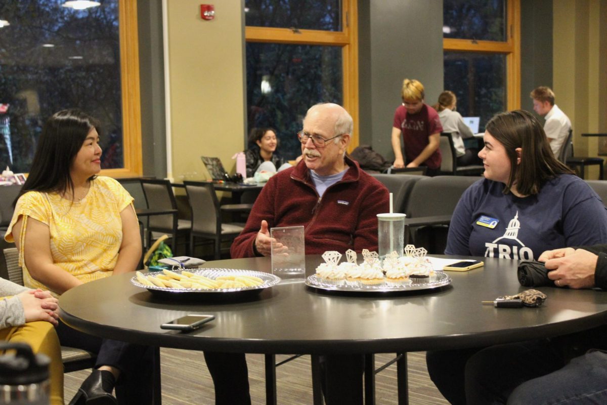 Xong Song Yang (left), Director of the Office of International Student and Scholar Services, Daniel Lee (middle), religions professor, and Anna Badamo (right), TRIO employee, talk at “First Gen Gems.”