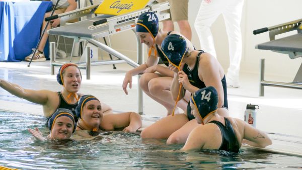 The Augustana College Women Water Polo enjoys their break during the USA Water Polo DIII National Tournament on Sunday, May 7, 2023.