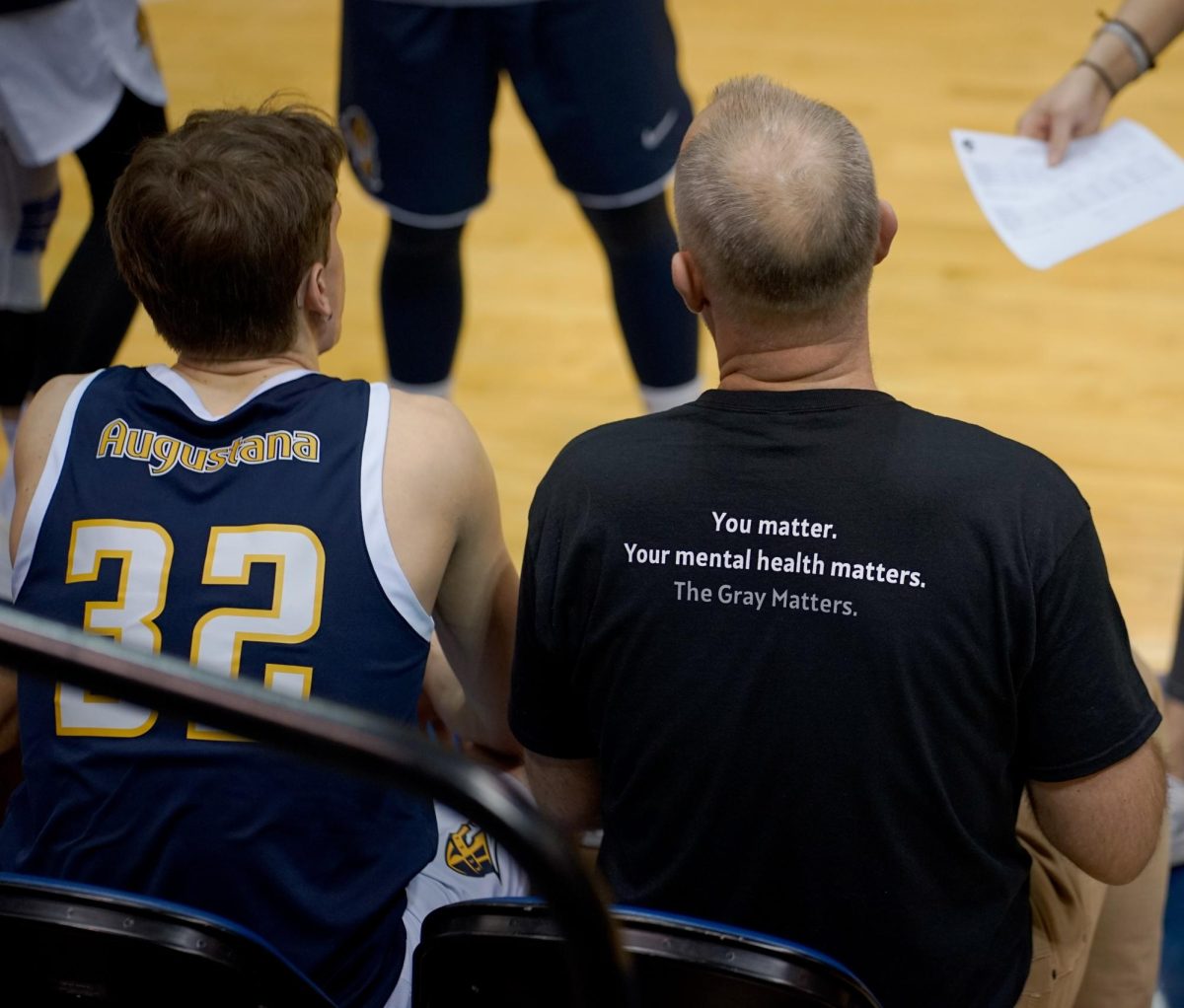 Augustana Men’s Volleyball Head Coach Mike Ducey wears The Grey Matters merch at the home game on Feb 17.