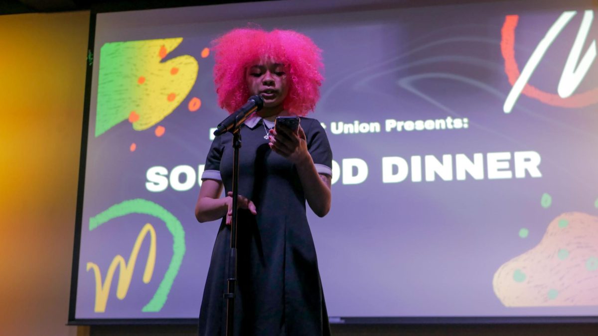 Junior Phoenix Agyepong recites the poem (Black) Hair by Ashley M. Jones for the dinner. The poem, originally longer but shortened by Phoenix, spoke about the power and intimacy of hair for Black people.