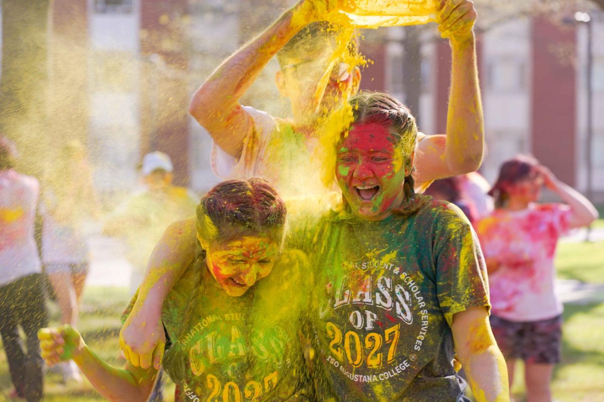 Augustana College students celebrate Holi, hosted by the Global Engagement Team, at Upper Quad on April 19.