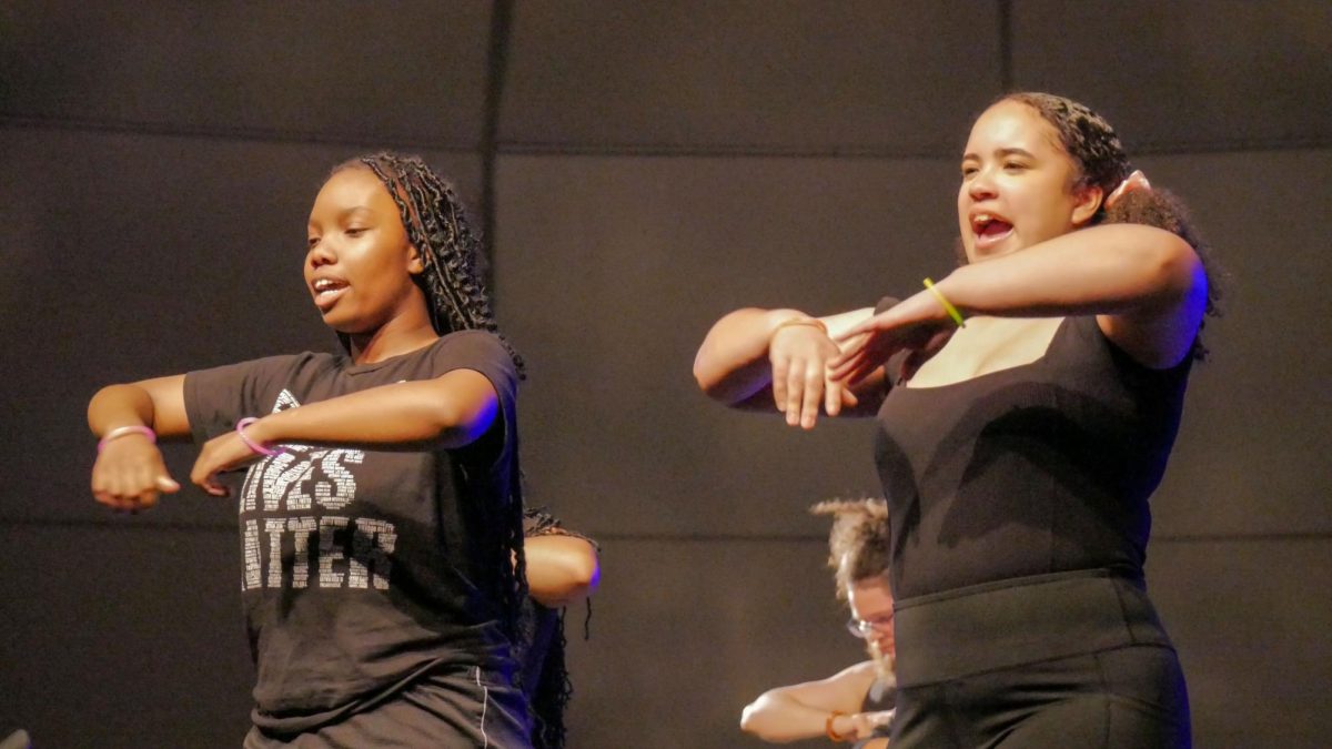 Junior Aniyah Davis and Sophomore Raigna Hels perform an original choreography named ‘I Wish You Would’ during the Spring Showcase.