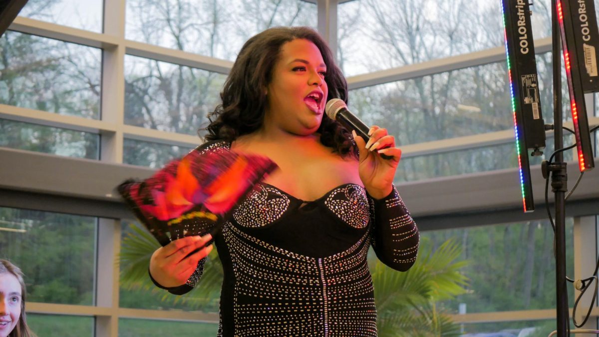 Guest emcee Christina King leads the night with an enthusiastic introduction to every performer. She teases the audience, and the staff, and uplifts the spirit of the night.