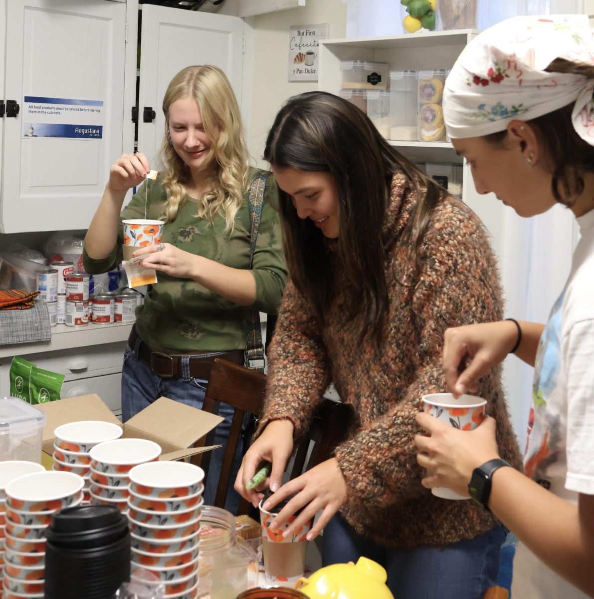 Sophomores Kaelyn Kamholtz, Sofia Carr and Lilli Burton make tea at Brewing Friendships on Oct. 17.