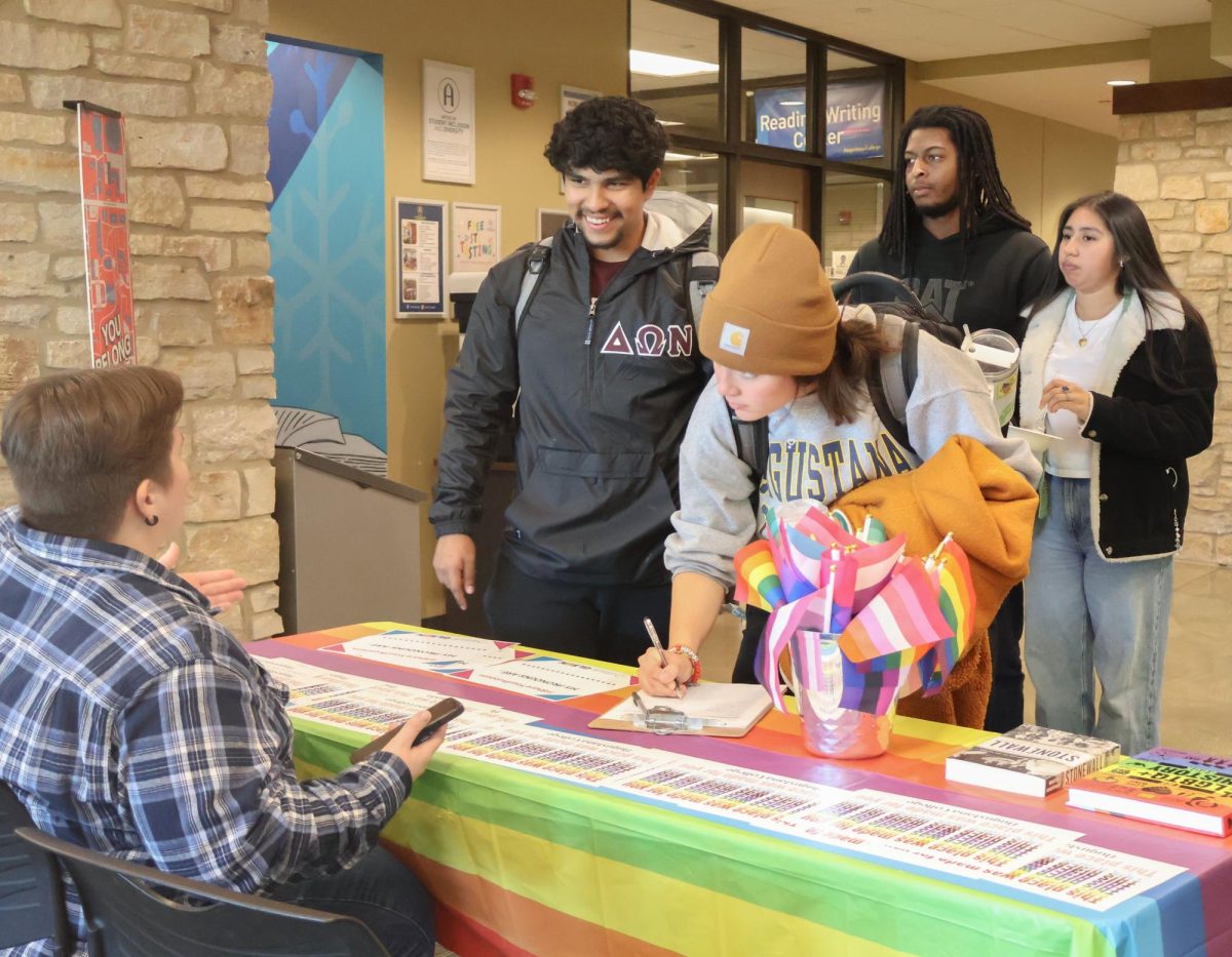 Several Augustana students come together to participate in International Pronouns Day at the You Belong Here Lounge on Oct. 16, 2024.