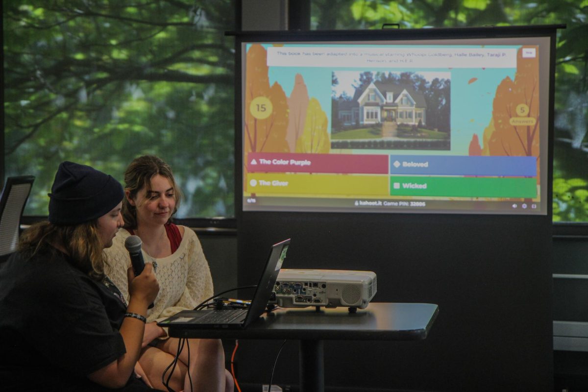 Co-presidents of Unabridged Sophomores Cassie Kontos and Mckenna Lewis host the Banned Books Week trivia at the Brew on Sept. 26, 2024.