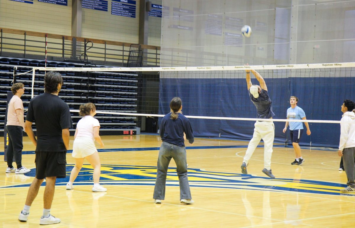 HEPE Volleyball students play their final game during class at the Roy J. Carver Physical Education Center on Oct. 17. From Spring 2025, HEPE is no longer a requirement to graduate.