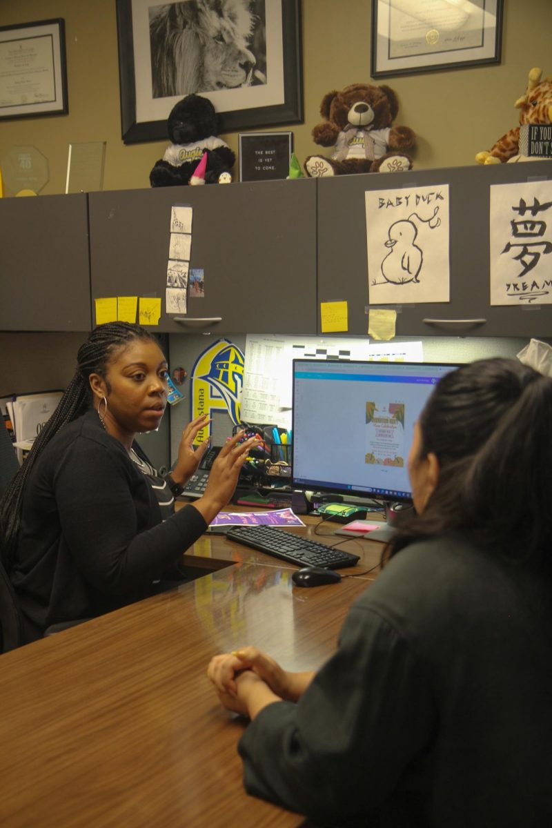 Ashley Allen, Director of Office of Student Inclusion and Diversity works with Senior Sangamitra Shakya on her project on Sept 23, 2024.