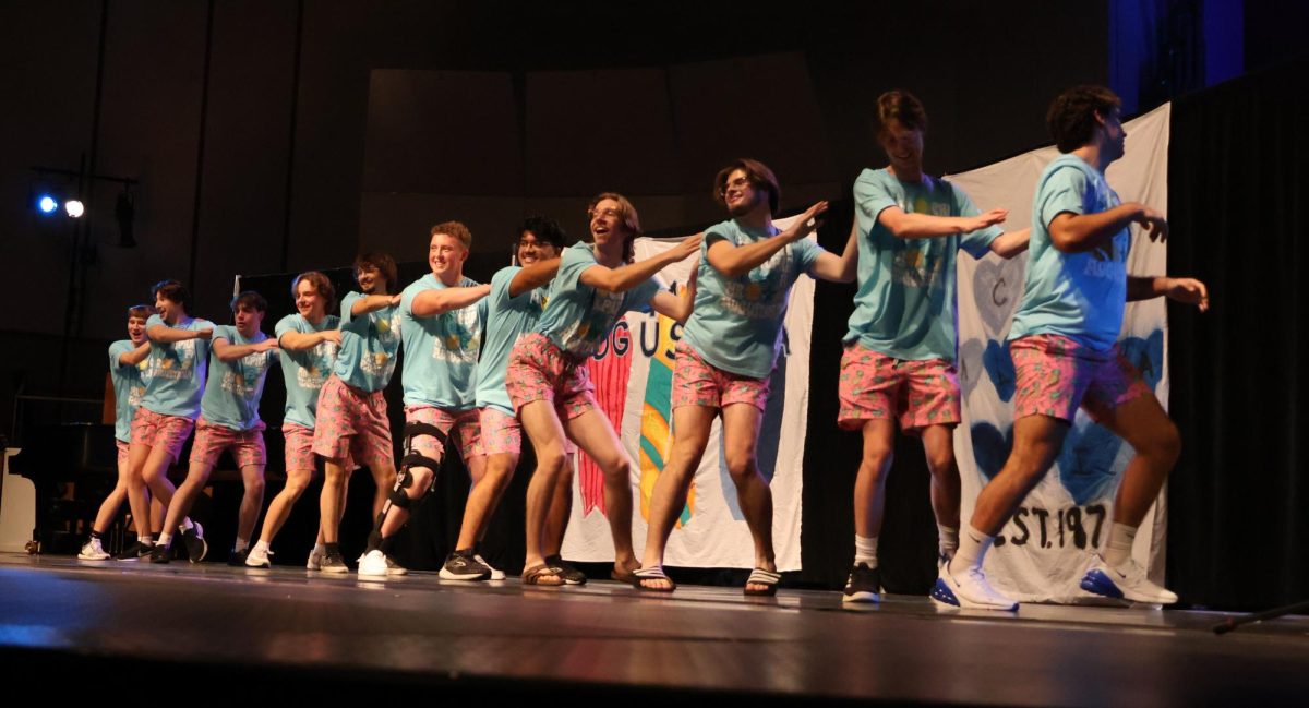 Contestants of Mr. Augustana, a mock male beauty pageant held by Chi Alpha Pi since 2002, are introduced to the audience in Centennial Hall, on Saturday, Nov. 16, 2024. All proceeds from the event go to the American Cancer Society.