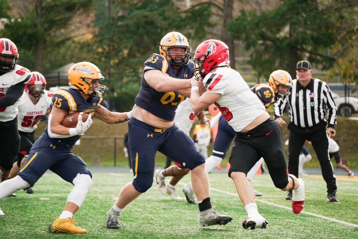 Augustana offensive lineman Jimmy Zitkus blocks a Carthage defender while looking back for running room during the home game on Nov. 9, 2024, at Lindberg Stadium. Augustana secured a decisive 31-21 victory against Carthage.