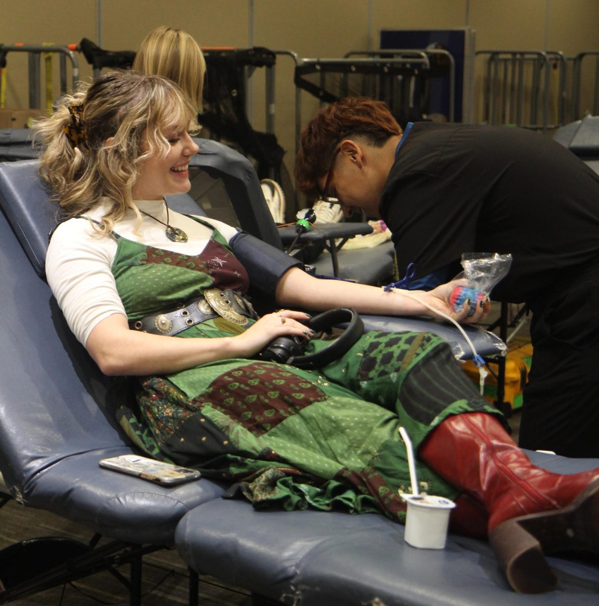 Senior Jenna Sorenson donates blood for the Blood Drive at the Gavle rooms on Nov. 14, 2024.