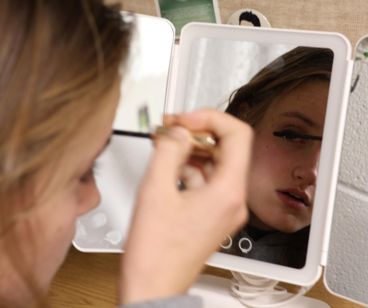 Sophomore Renee Jednachowski applies her makeup on Sunday, Dec. 8, 2024.