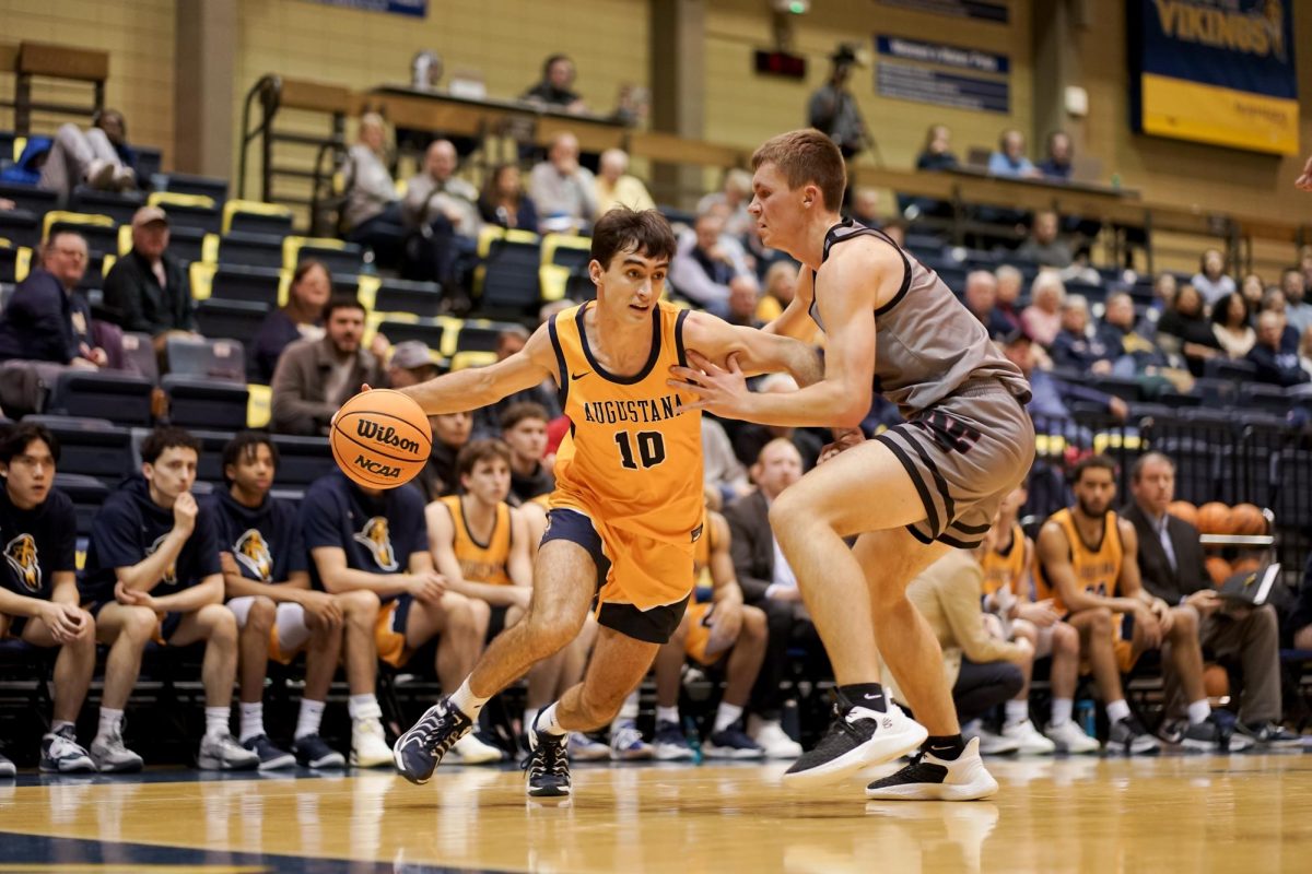 Augustana's #10 Dani Romero drives past a North Central College defender during a home game at Carver Center on Feb. 1, 2025.