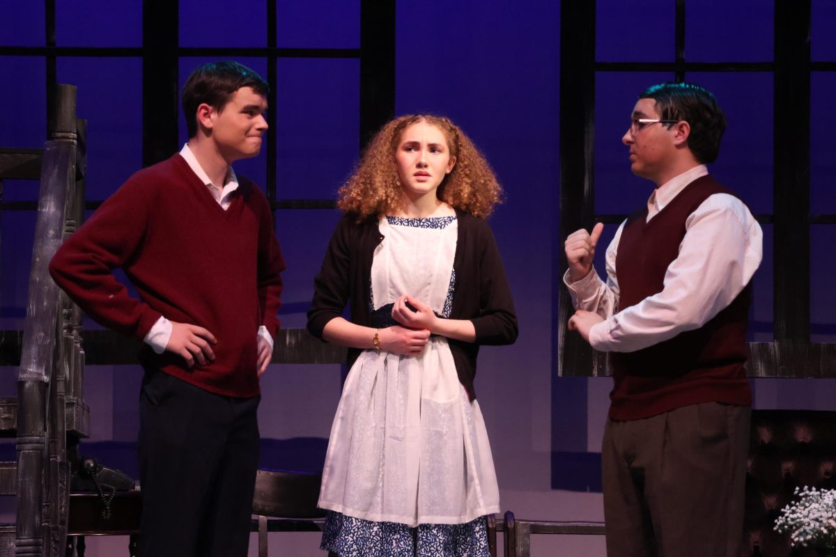 Left to right: Ryan Sondgeroth (Detective Sergeant Trotter), Vanessa Williams (Mollie Ralston) and Jack Pawlak (Giles Ralston) perform in Freshman Vanessa Williams performs as Mollie Ralston in Agatha Christie’s “The Mousetrap” directed by Dr. Jennifer Popple in Brunner’s Main Stage on Nov. 12, 2025.