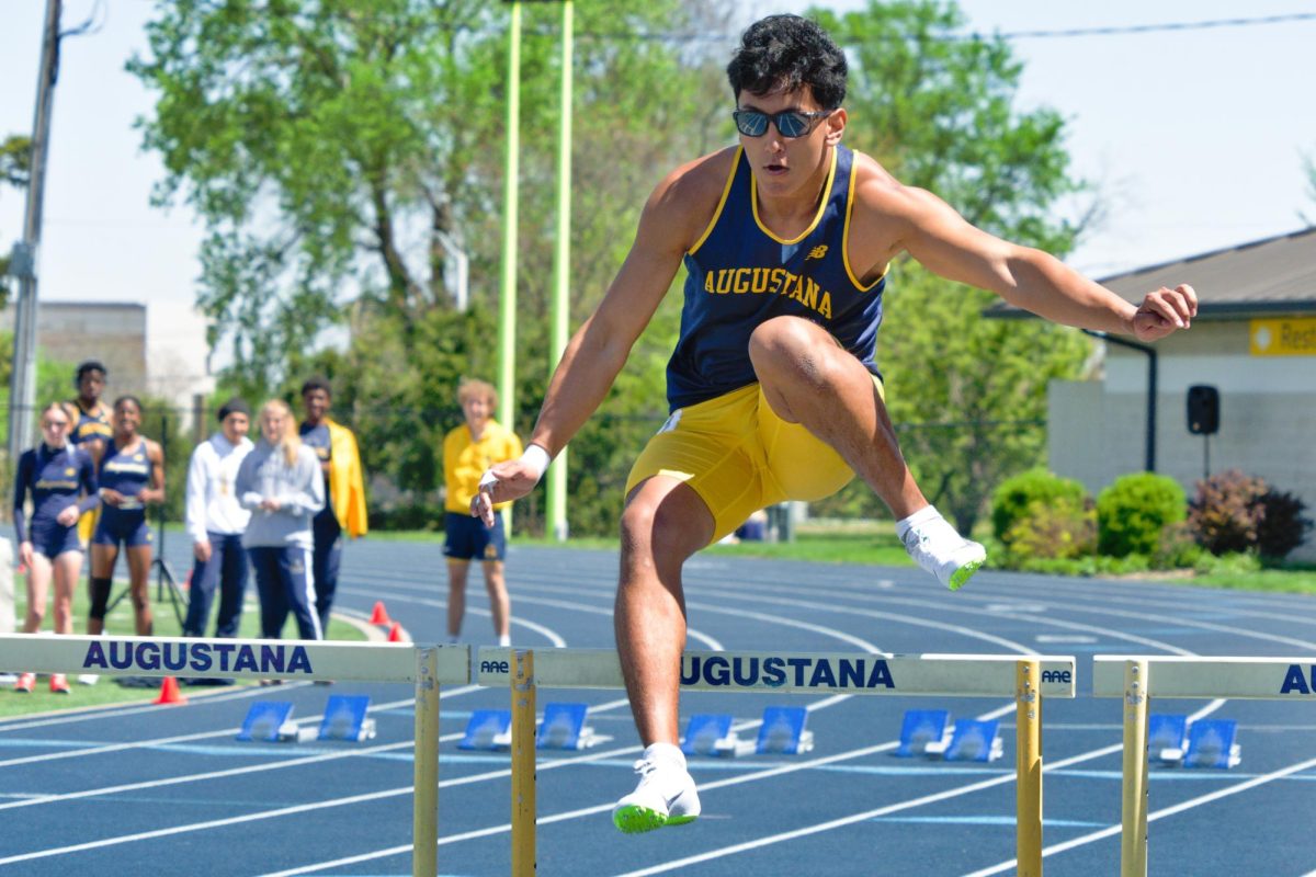 First-year Diego Gomez clears a hurdle during the men's 110-meter hurdles at Knowlton Outdoor Athletic Complex on April 25, 2026.