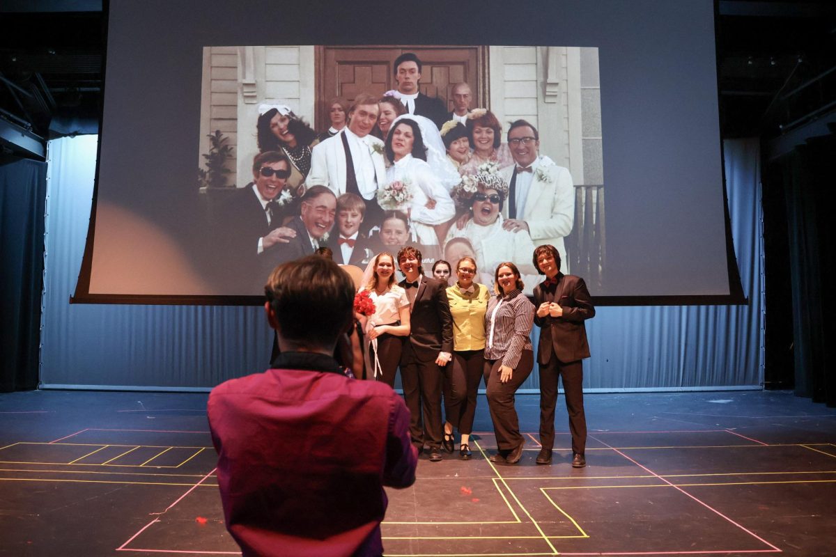 Rocky Horror: Rocky Horror Picture Show shadow cast members pose for a wedding photo during the performance